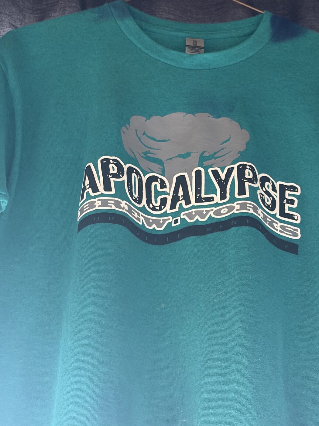 Teal logo tee